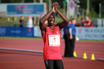 150714 - Welsh Athletics International held at the Cardiff International Sports Stadium - Christian Malcolm thanks the fans after completing his last ever race