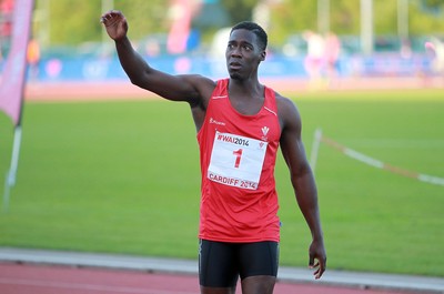 150714 - Welsh Athletics International held at the Cardiff International Sports Stadium - Christian Malcolm thanks the fans after completing his last ever race