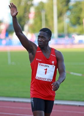 150714 - Welsh Athletics International held at the Cardiff International Sports Stadium - Christian Malcolm thanks the fans after completing his last ever race