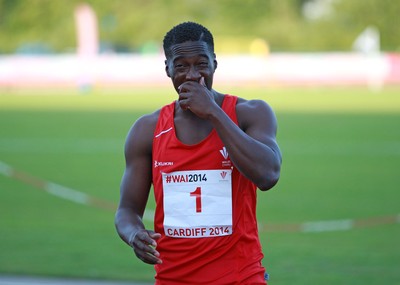 150714 - Welsh Athletics International held at the Cardiff International Sports Stadium - Christian Malcolm thanks the fans after completing his last ever race