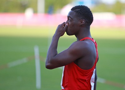 150714 - Welsh Athletics International held at the Cardiff International Sports Stadium - Christian Malcolm thanks the fans after completing his last ever race