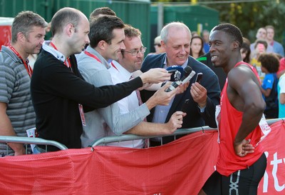 150714 - Welsh Athletics International held at the Cardiff International Sports Stadium - Christian Malcolm talks to the media after completing his last ever race