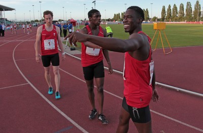 150714 - Welsh Athletics International held at the Cardiff International Sports Stadium - Christian Malcolm thanks his team mates after completing his last ever race