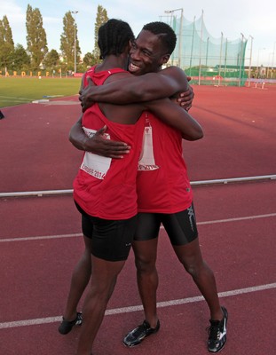 150714 - Welsh Athletics International held at the Cardiff International Sports Stadium - Christian Malcolm thanks his team mates after completing his last ever race