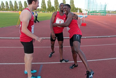 150714 - Welsh Athletics International held at the Cardiff International Sports Stadium - Christian Malcolm thanks his team mates after completing his last ever race