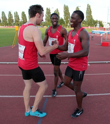 150714 - Welsh Athletics International held at the Cardiff International Sports Stadium - Christian Malcolm thanks his team mates after completing his last ever race