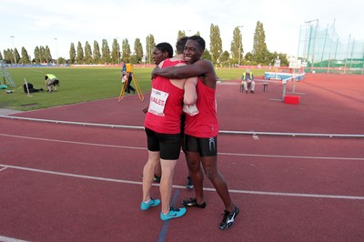 150714 - Welsh Athletics International held at the Cardiff International Sports Stadium - Christian Malcolm thanks his team mates after completing his last ever race