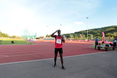 150714 - Welsh Athletics International held at the Cardiff International Sports Stadium - Christian Malcolm thanks the fans after completing his last ever race