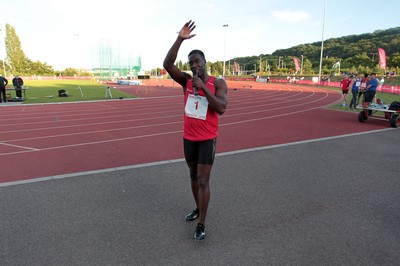 150714 - Welsh Athletics International held at the Cardiff International Sports Stadium - Christian Malcolm thanks the fans after completing his last ever race