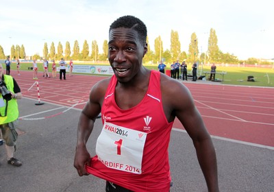 150714 - Welsh Athletics International held at the Cardiff International Sports Stadium - Christian Malcolm thanks the fans after completing his last ever race