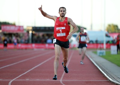 150714 - Welsh Athletics International held at the Cardiff International Sports Stadium - Chris Gowell of Wales runs in the first sub 4 minute mile in Wales in 25 years