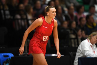 221125 - Welsh Feathers v Zimbabwe Gems - International Netball Match - Millie Carter of Wales makes her debut