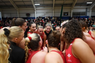 221125 - Welsh Feathers v Zimbabwe Gems - International Netball Match - Wales huddle