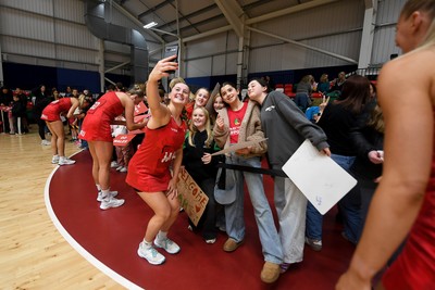 221125 - Welsh Feathers v Zimbabwe Gems - International Netball Match - Bethan Dyke of Wales with fans