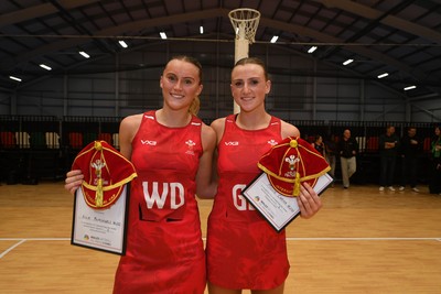 221125 - Welsh Feathers v Zimbabwe Gems - International Netball Match -  Ellie Blackwell of Wales and Millie Carter of Wales get their first caps