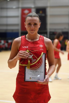 221125 - Welsh Feathers v Zimbabwe Gems - International Netball Match - Millie Carter of Wales gets her first cap