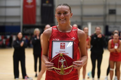 221125 - Welsh Feathers v Zimbabwe Gems - International Netball Match - Ellie Blackwell of Wales gets her first cap