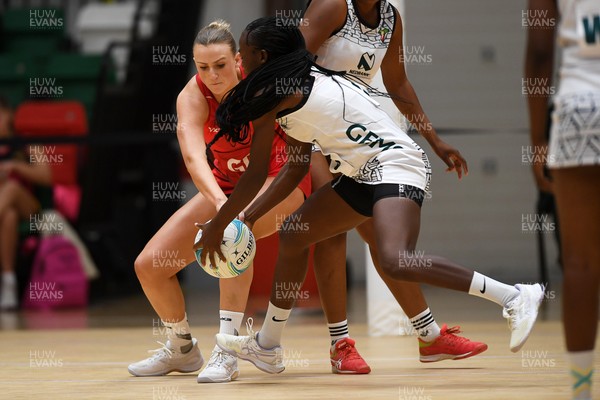 221125 - Welsh Feathers v Zimbabwe Gems - International Netball Match - Millie Carter of Wales