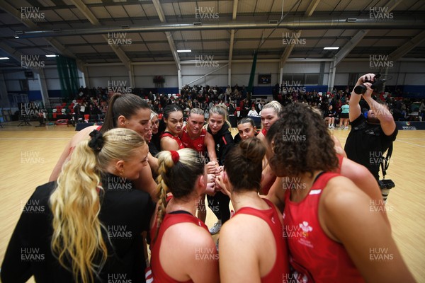 221125 - Welsh Feathers v Zimbabwe Gems - International Netball Match - Wales huddle