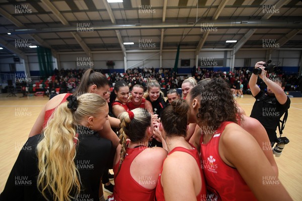 221125 - Welsh Feathers v Zimbabwe Gems - International Netball Match - Wales huddle