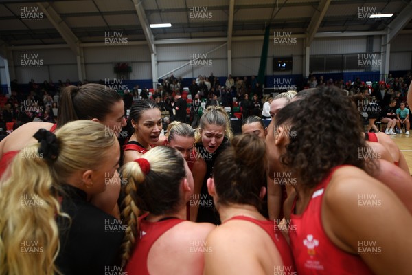 221125 - Welsh Feathers v Zimbabwe Gems - International Netball Match - Wales huddle