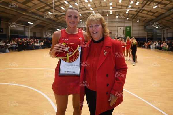 221125 - Welsh Feathers v Zimbabwe Gems - International Netball Match - Millie Carter of Wales gets her first cap