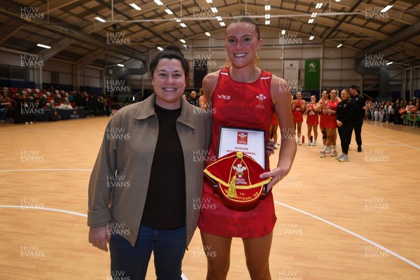 221125 - Welsh Feathers v Zimbabwe Gems - International Netball Match - Ellie Blackwell of Wales gets her first cap