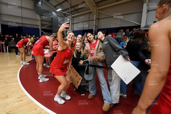 221125 - Welsh Feathers v Zimbabwe Gems - International Netball Match - Bethan Dyke of Wales with fans