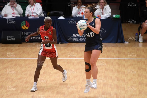 231125 - Welsh Feathers v Zimbabwe Gems - International Netball Match - Ella Powell-Davies of Wales