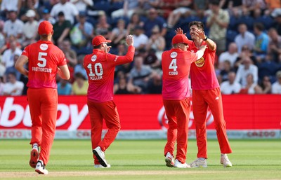 130822 - Welsh Fire Men v Birmingham Phoenix Men, The Hundred - George Scrimshaw of Welsh Fire celebrates after taking the wicket of Liam Livingstone of Birmingham Phoenix