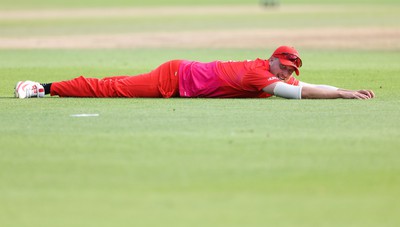 130822 - Welsh Fire Men v Birmingham Phoenix Men, The Hundred - Josh Cobb of Welsh Fire looks on as the ball goes for 4