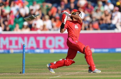 120826 - Welsh Fire Women v London Spirit Women, The Hundred - Rachin Ravindra of Welsh Fire loses his bat as he plays a shot and is caught by David Willey