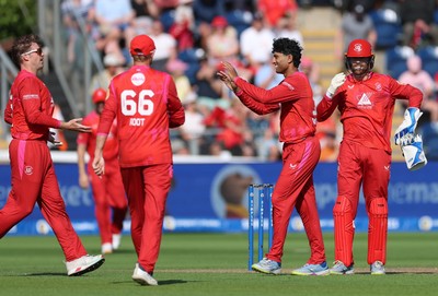290726 - Welsh Fire Men v Trent Rockets Men, The Hundred - Rachin Ravindra of Welsh Fire celebrates as he dismisses Finn Allen of Trent Rockets