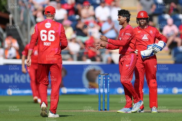 290726 - Welsh Fire Men v Trent Rockets Men, The Hundred - Rachin Ravindra of Welsh Fire celebrates as he dismisses Finn Allen of Trent Rockets