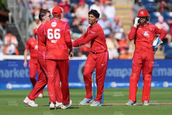 290726 - Welsh Fire Men v Trent Rockets Men, The Hundred - Rachin Ravindra of Welsh Fire celebrates as he dismisses Finn Allen of Trent Rockets
