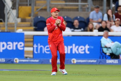 250726 - Welsh Fire v MI London - The Hundred - Jordan Cox of Welsh Fire catches the ball to dismiss Sam Curran of MI London 