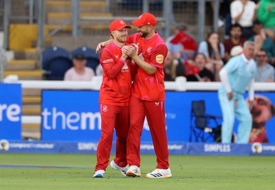 250726 - Welsh Fire v MI London - The Hundred - Jordan Cox of Welsh Fire celebrates with team mates after catching the ball to dismiss Sam Curran off the bowling of Lockie Ferguson