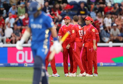 250726 - Welsh Fire v MI London - The Hundred - Jordan Cox of Welsh Fire celebrates with team mates after catching the ball to dismiss Sam Curran off the bowling of Lockie Ferguson