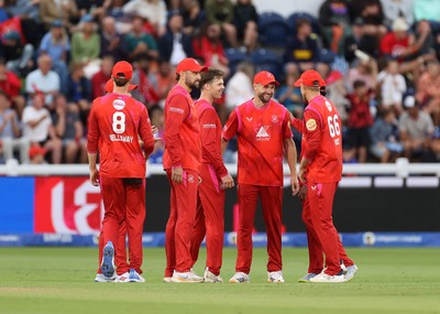 250726 - Welsh Fire v MI London - The Hundred - Jordan Cox of Welsh Fire celebrates with team mates after catching the ball to dismiss Sam Curran off the bowling of Lockie Ferguson