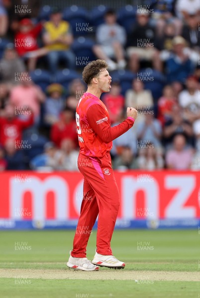 250726 - Welsh Fire v MI London - The Hundred - Lockie Ferguson of Welsh Fire celebrates taking the wicket of Jason Roy of MI London