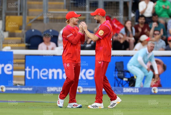250726 - Welsh Fire v MI London - The Hundred - Jordan Cox of Welsh Fire celebrates with team mates after catching the ball to dismiss Sam Curran off the bowling of Lockie Ferguson