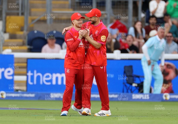 250726 - Welsh Fire v MI London - The Hundred - Jordan Cox of Welsh Fire celebrates with team mates after catching the ball to dismiss Sam Curran off the bowling of Lockie Ferguson