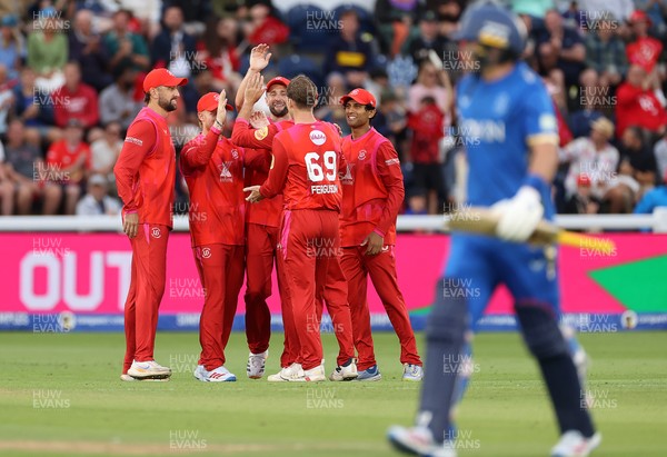 250726 - Welsh Fire v MI London - The Hundred - Jordan Cox of Welsh Fire celebrates with team mates after catching the ball to dismiss Sam Curran off the bowling of Lockie Ferguson
