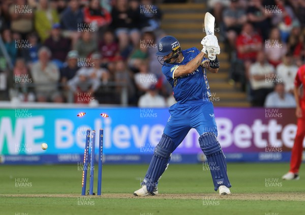 250726 - Welsh Fire v MI London - The Hundred - Tom Curran of MI London is bowled out by Lockie Ferguson