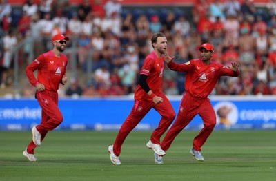 030826 - Welsh Fire v Southern Brave - The Hundred - Sam Cook of Welsh Fire celebrates taking the wicket of Jamie Smith who was caught by Phil Salt