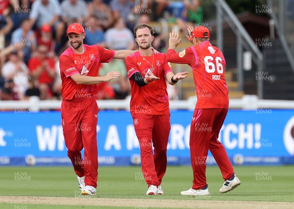 030826 - Welsh Fire v Southern Brave - The Hundred - Sam Cook of Welsh Fire celebrates taking the wicket of Nikhil Chaudhary, caught by Phil Salt