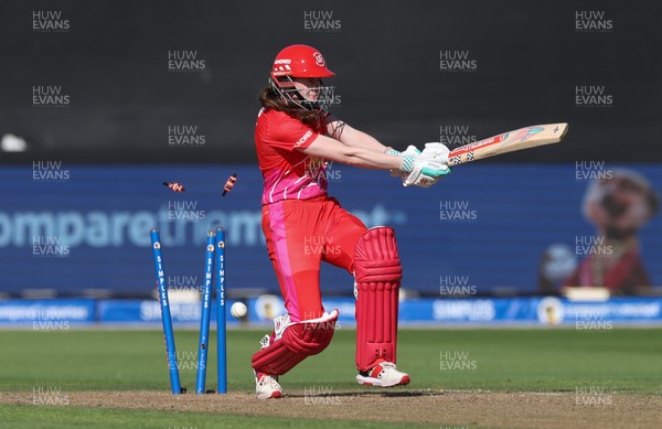 100824 - Welsh Fire v Birmingham Phoenix, The Hundred - Sarah Bryce of Welsh Fire is bowled out by Ellyse Perry