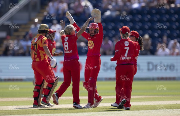 130822 - Welsh Fire Women v Birmingham Phoenix Women, The Hundred - Claire Nicholas of Welsh Fire celebrates with Sarah Bryce of Welsh Fire after taking the wicket of Eve Jones of Birmingham Phoenix