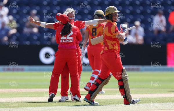 130822 - Welsh Fire Women v Birmingham Phoenix Women, The Hundred - Katie George of Welsh Fire and Tammy Beaumont of Welsh Fire celebrate taking the wicket of Sophie Devine of Birmingham Phoenix