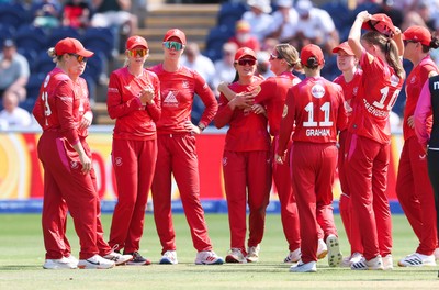 120826 - Welsh Fire Women v London Spirit Women, The Hundred - Welsh Fire celebrate after taking the wicket of Charlie Dean of London Spirit